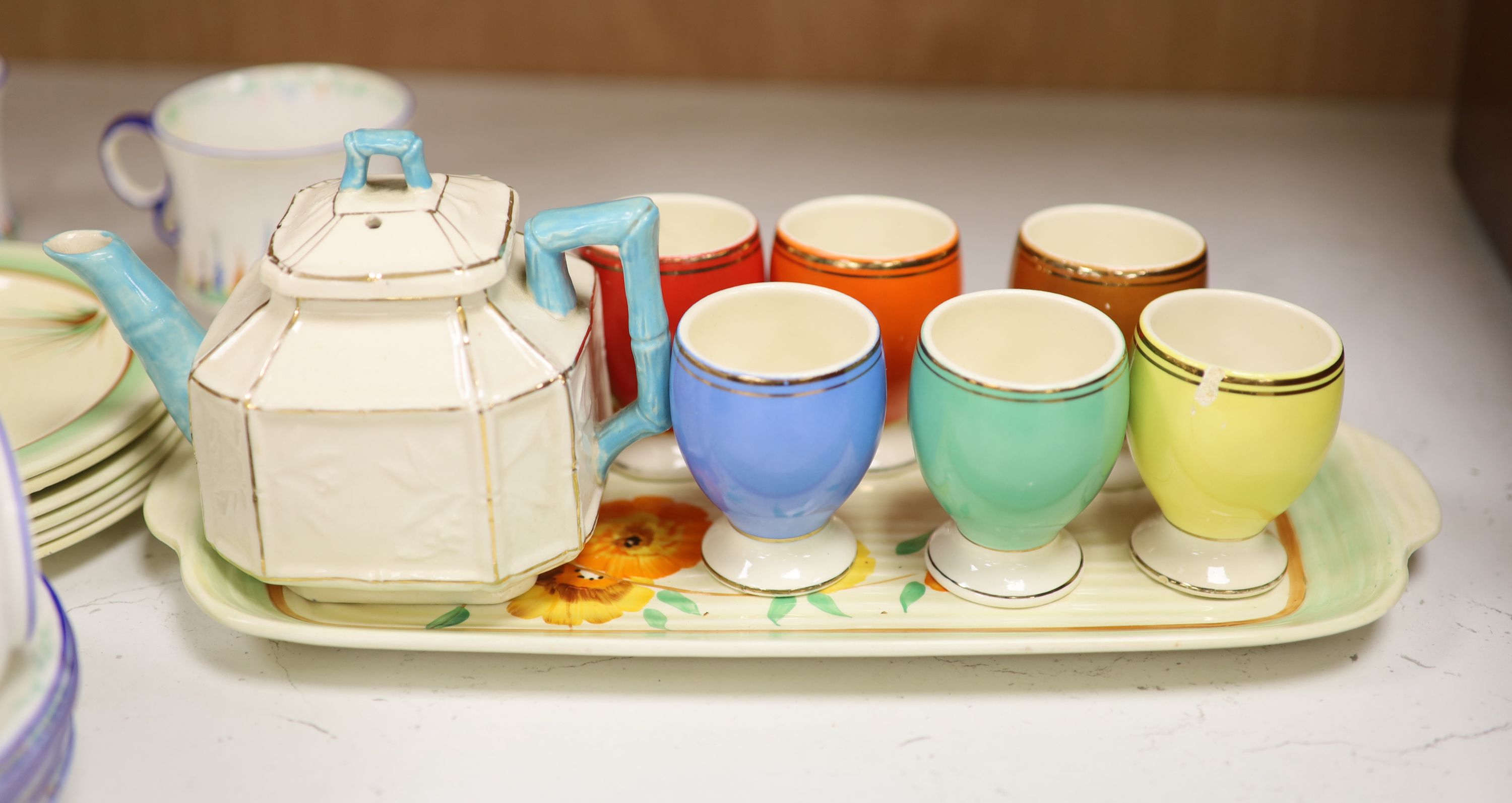 A quantity of ceramics to include Clarice Cliff and Beswick